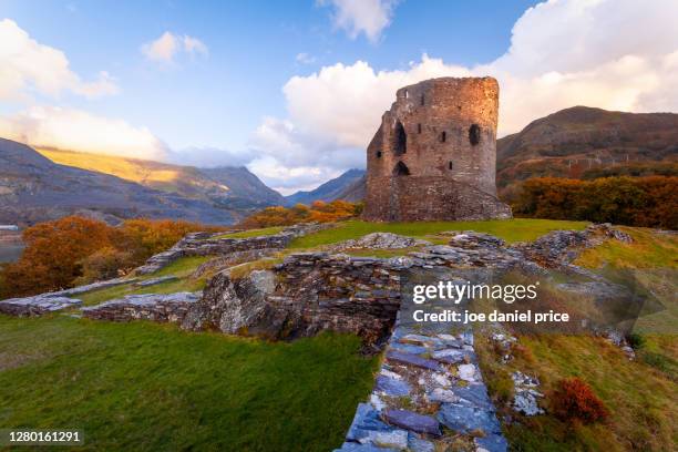 sunset at the ruined dolbadarn castle, llanberis, snowdonia, wales - wales bildbanksfoton och bilder