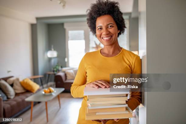 portrait of female professor at home - assistant professor stock pictures, royalty-free photos & images