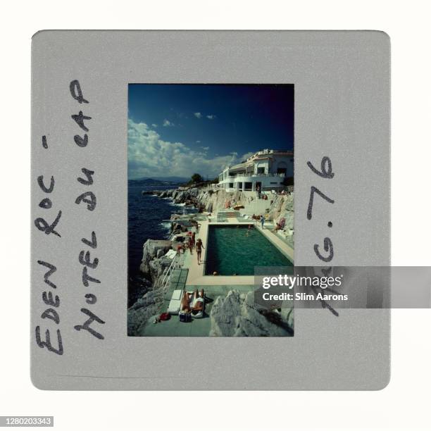 Guests by the pool at the Hotel du Cap Eden-Roc, Antibes, France, August 1976.