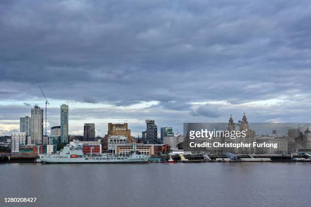 View of the Liverpool skyline from across the River Mersey on October 14, 2020 in Liverpool, England. The Liverpool City Region was placed into the...
