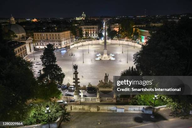 rome skyline and piazza del popolo with obelisk and twin churches illuminated at night in rome, lazio, italy - piazza del popolo rome foto e immagini stock