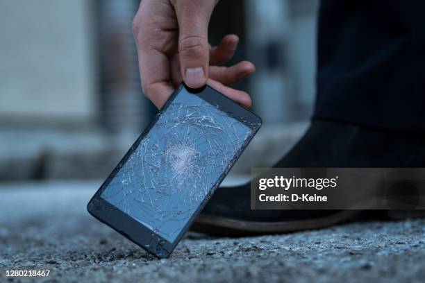 broken smartphone - damaged phone stock pictures, royalty-free photos & images