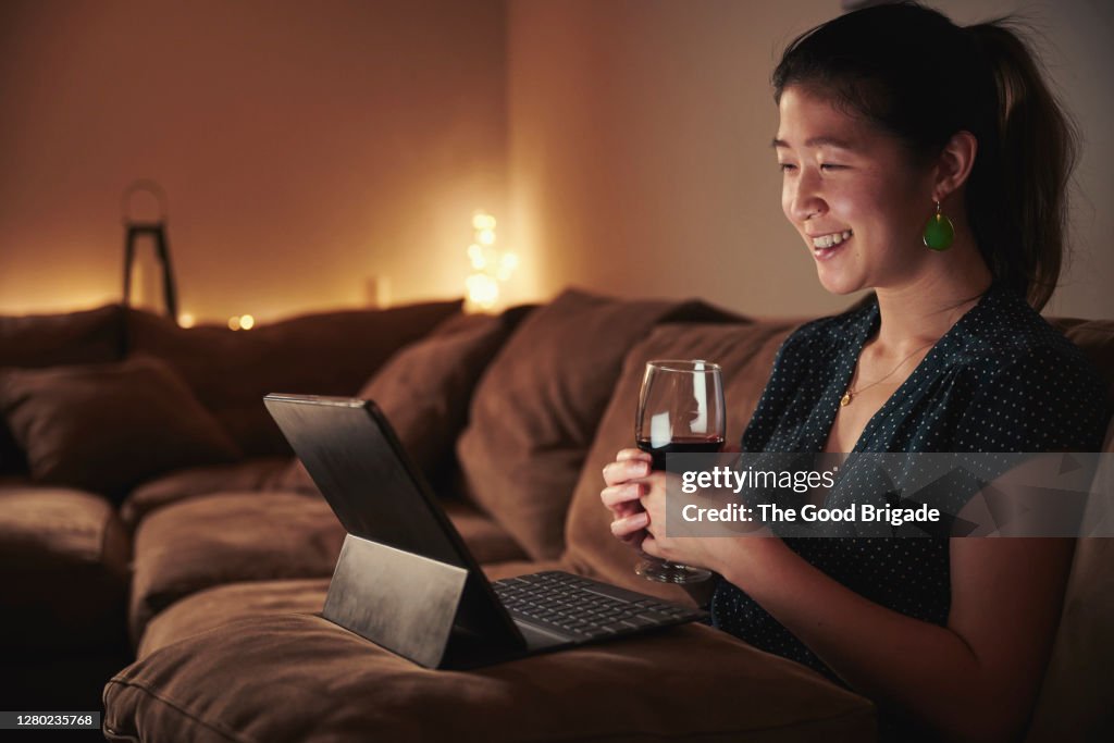 Woman having online date with boyfriend