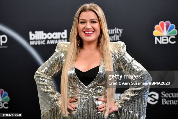 In this image released on October 14, Kelly Clarkson poses backstage at the 2020 Billboard Music Awards, broadcast on October 14, 2020 at the Dolby...