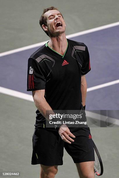 Andy Murray of Great Britain reacts during his match against Marcos Baghdatis of Cyprus during the day three of the Rakuten Open at Ariake Colosseum...