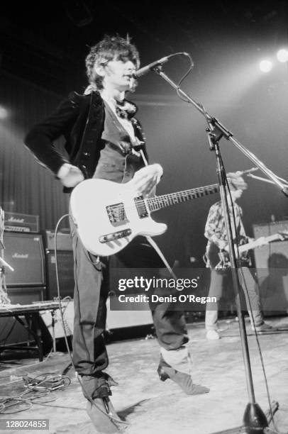 American musician Johnny Thunders on stage with The Heartbreakers at the Lyceum Theatre, London, 23rd August 1984.