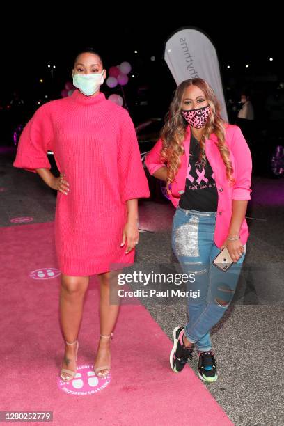 Actress Jasmine Luv and Producer Tressa Azarel Smallwood of MegaMind Media attend the "Pull Up & Park" breast cancer awareness & BET Her films...