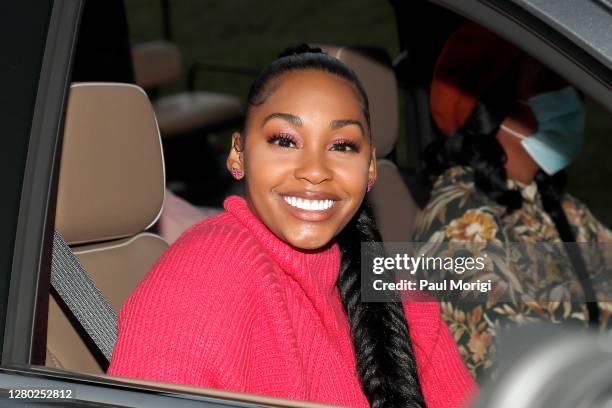 Actress Jasmine Luv arrives at the "Pull Up & Park" breast cancer awareness & BET Her films screening event at RFK Stadium on October 14, 2020 in...