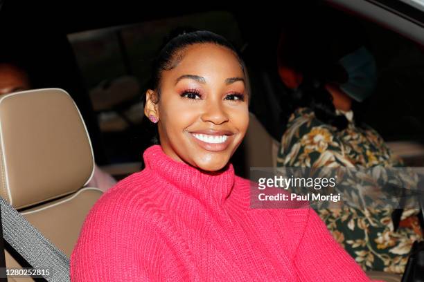 Actress Jasmine Luv arrives at the "Pull Up & Park" breast cancer awareness & BET Her films screening event at RFK Stadium on October 14, 2020 in...