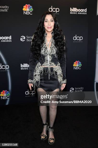In this image released on October 14, Cher poses backstage at the 2020 Billboard Music Awards, broadcast on October 14, 2020 at the Dolby Theatre in...