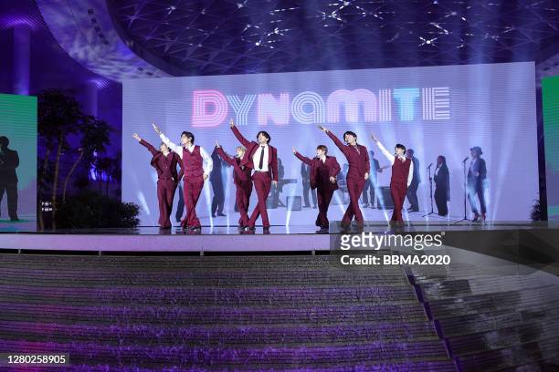 In this image released on October 14, RM, V, Jimin, Jungkook, Jin, J-Hope, and Suga of BTS perform onstage at the 2020 Billboard Music Awards,...