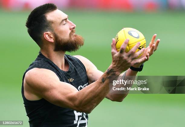 Charlie Dixon of Port Adelaide marks during a Port Adelaide Power AFL training session at Adelaide Oval on October 15, 2020 in Adelaide, Australia.