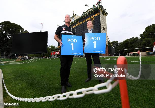 Port Adelaide Executive General Manager, Matthew Richardson and Adelaide Oval Stadium Management Authority CEO Andrew Daniels in a sectioned crowd...