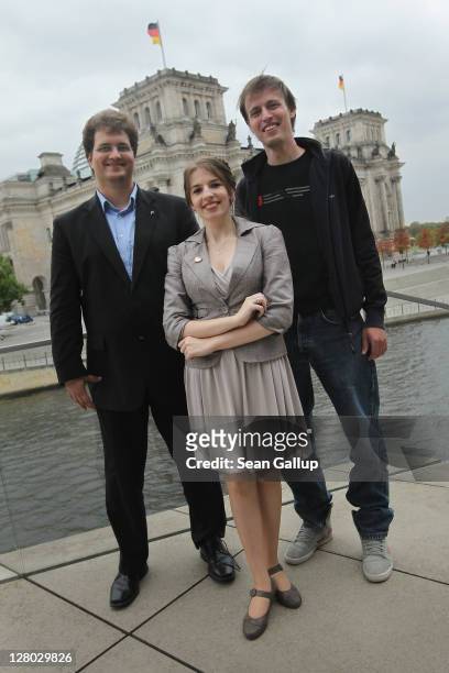 Piratenpartei Chairman Sebastian Nerz, Managing Director Marina Weisband and Berlin head Andreas Baum pose for a brief photo in front of the...