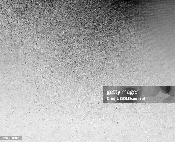 concrete surface with grainy effect and delicate blurred - vector illustration in close up with perspective and gradient effect - spotted wavy dirty surface in shades of white and black - abstract raw textured paper background - raw titanium stock illustrations