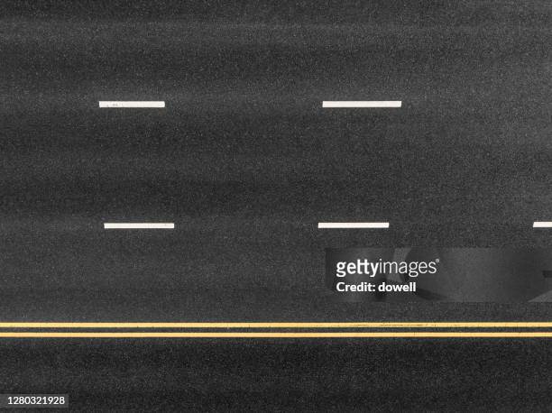 new asphalt road with traffic sign - macadam photos et images de collection