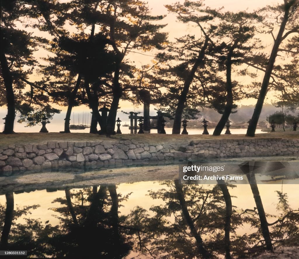 Torii Gate & Laterns At Itsukushima Shrine
