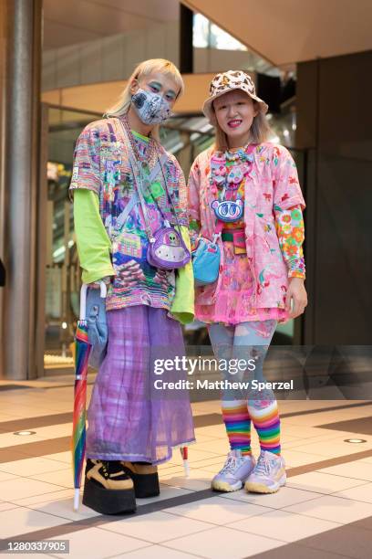 Guests are seen on the street wearing colorful outfits during the Rakuten Fashion Week Tokyo 2021 Spring/Summer on October 15, 2020 in Tokyo, Japan.