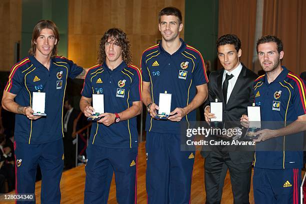 Spanish football team players Sergio Ramos, Carles Puyol, Gerard Pique, Jesus Navas and Juan Mata pose for the photographers during "Real Orden del...