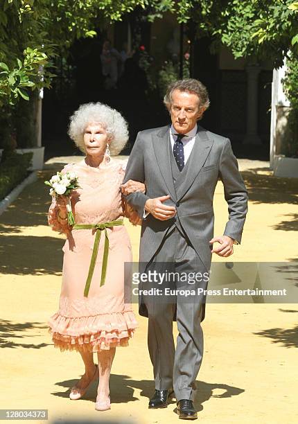 Duchess of Alba, Cayetana Fitz-James Stuart and Alfonso Diez leave Duenas Palace to welcome people on October 5, 2011 in Seville, Spain.