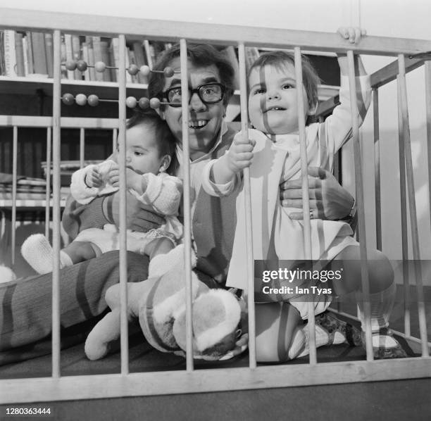 Scottish comedian Ronnie Corbett with his daughters Sophie and Emma, January 1969.