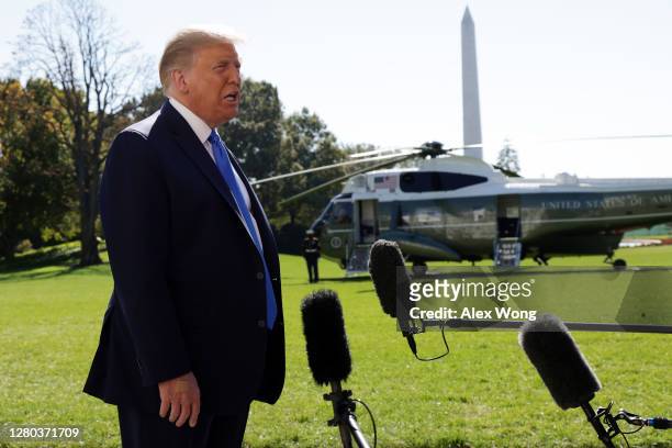 President Donald Trump speaks to members of the press prior to a Marine One departure from the White House October 15, 2020 in Washington, DC....