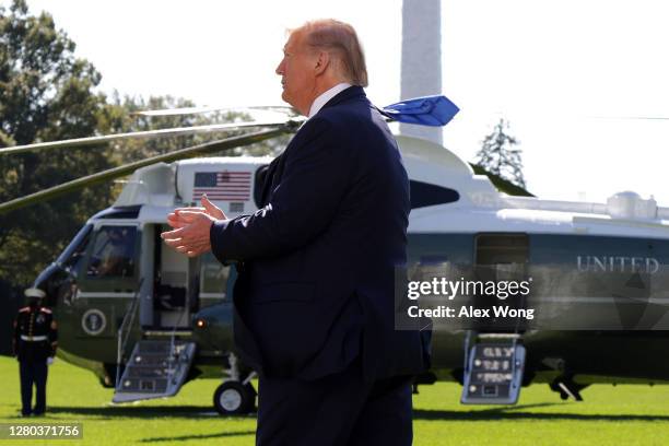 President Donald Trump walks towards Marine One prior as he departs the White House October 15, 2020 in Washington, DC. President Trump is traveling...