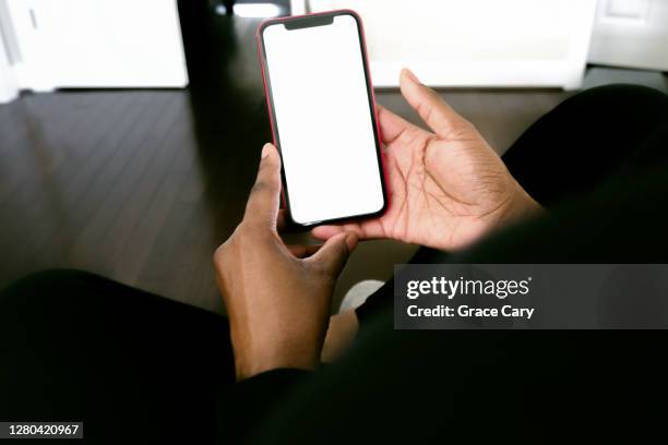 woman checks smart phone - phone blank screen stock pictures, royalty-free photos & images