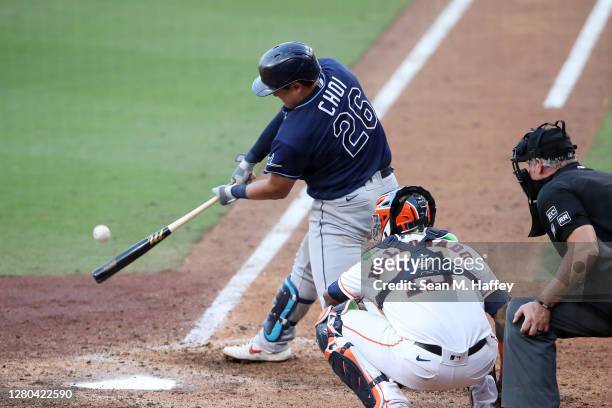 Ji-Man Choi of the Tampa Bay Rays hits a solo home run during the eighth inning against the Houston Astros in Game Five of the American League...