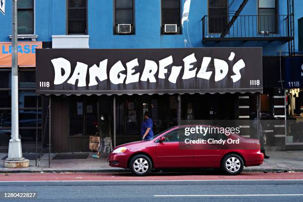 People walk by Dangerfield's Comedy Club on October 15, 2020. Dangerfield's, which opened in 1969, announced that it has permanently closed the venue...