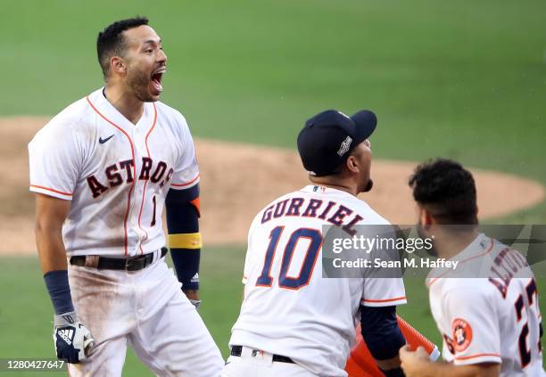 Carlos Correa of the Houston Astros celebrates a walk off home run to win 4-3 against Tampa Bay Rays in Game Five of the American League Championship...