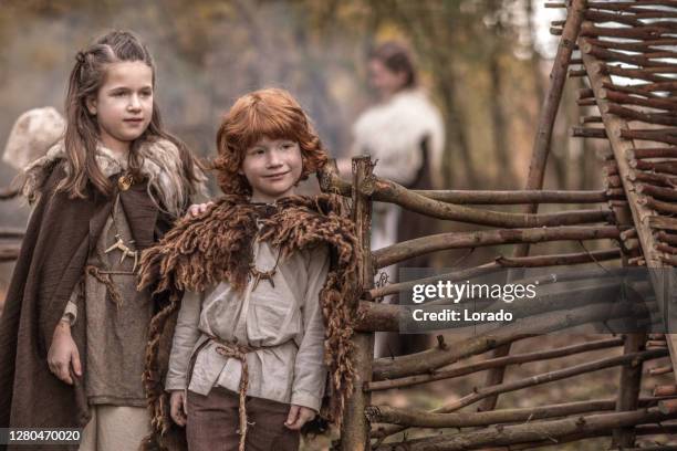 viking children in a viking village settlement - children's museum stock pictures, royalty-free photos & images