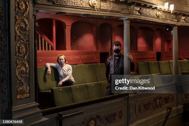 Artistic Director Tom Morris, and Executive Director Charlotte Geeves pose for a portrait wearing face masks at the Bristol Old Vic theatre on...