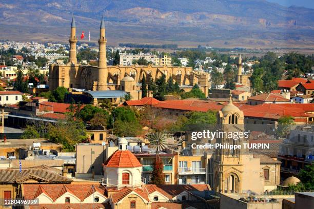 cyprus, nicosia, panayia fanaromeni church and the mosque of selim at back - republic of cyprus stock pictures, royalty-free photos & images