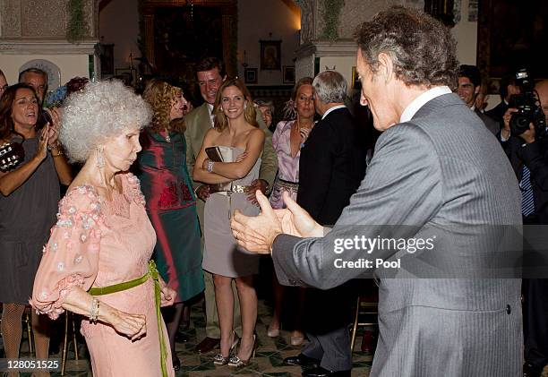 Duchess of Alba, Maria del Rosario Cayetana Fitz-James-Stuart and Alfonso Diez Carabantes dancing during their wedding ceremony held at Duenas Palace...