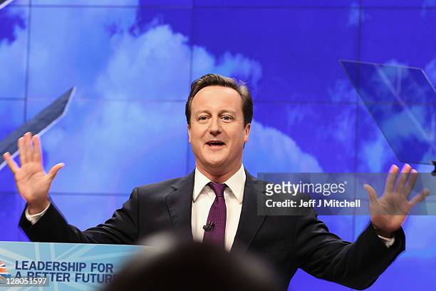 British Prime Minister David Cameron delivers his keynote speech to delegates at the annual Conservative Party Conference at Manchester Central on...