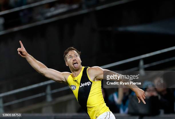 Kane Lambert of the Tigers celebrates after scoring a goal during the AFL First Preliminary Final match between the Port Adelaide Power and Richmond...