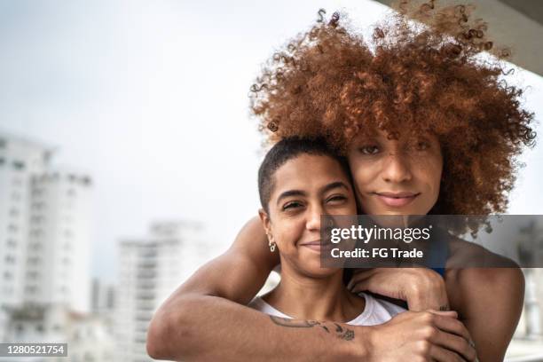 portrait of a happy homosexual couple - transgender stock pictures, royalty-free photos & images