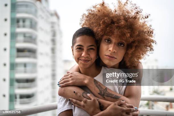 portrait of a happy homosexual couple - transgender stock pictures, royalty-free photos & images