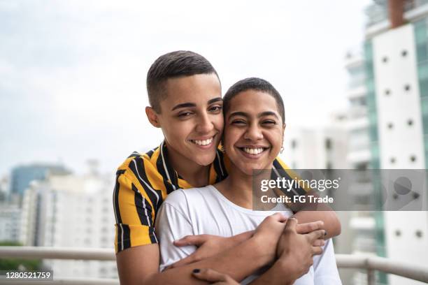 portrait of a happy homosexual couple - nb stock pictures, royalty-free photos & images