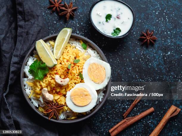 high angle view of food on table - vegetable fried rice stock-fotos und bilder