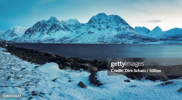 scenic view of snowcapped mountains against sky - schats stock pictures, royalty-free photos & images