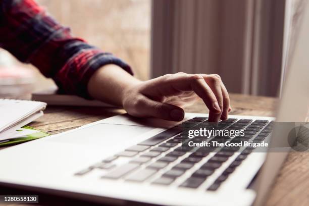 close up teenage girl using laptop computer - girl using laptop stock pictures, royalty-free photos & images