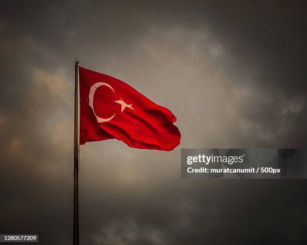 low angle view of flag against sky,turkey - bandera turca fotografías e imágenes de stock