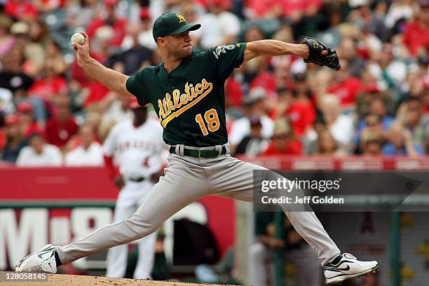 Rich Harden of the Oakland Athletics pitches against the Los Angeles Angels of Anaheim in the third inning at Angel Stadium of Anaheim on September...