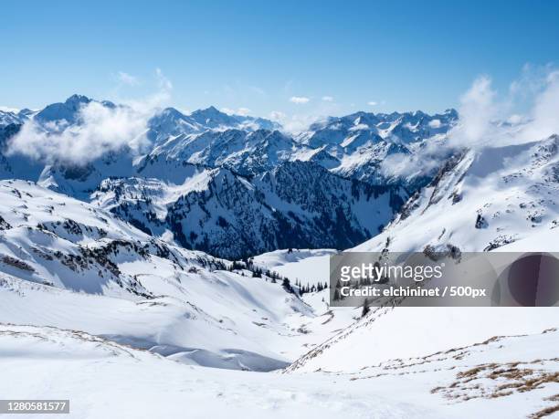 scenic view of snowcapped mountains against sky,nebelhorn,oberstdorf,germany - oberstdorf bildbanksfoton och bilder