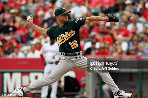 Rich Harden of the Oakland Athletics pitches against the Los Angeles Angels of Anaheim in the third inning at Angel Stadium of Anaheim on September...