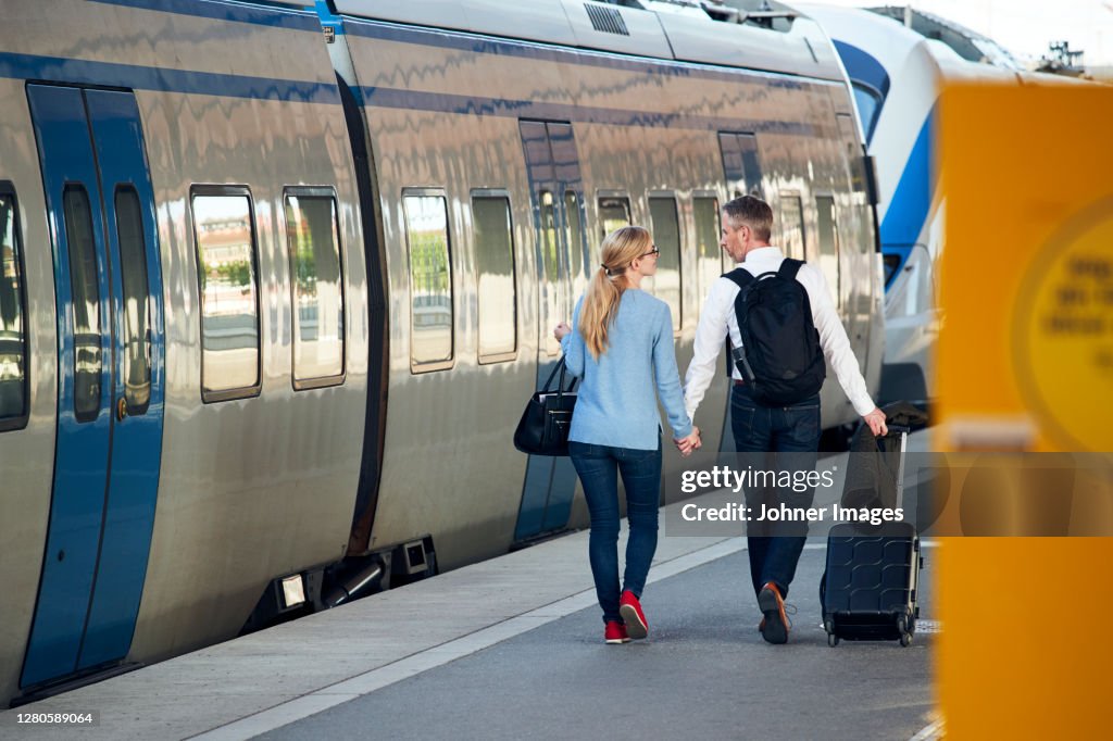 Couple at train station platform