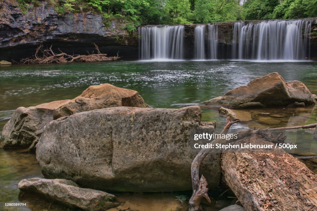 Scenic view of waterfall in forest, Ludlow Falls, Ohio, United States