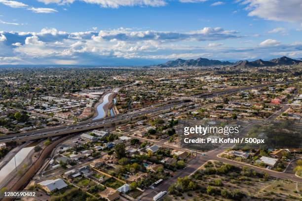 high angle view of cityscape against sky, phoenix, arizona, united states - phoenix arizona stock pictures, royalty-free photos & images